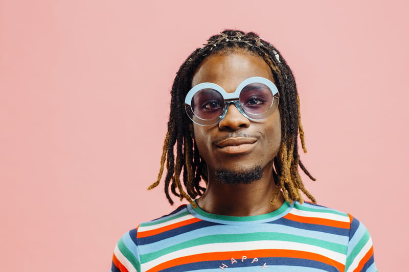 Smiling Man wearing unique sunglasses