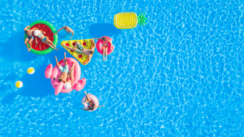 People laying on pool floats